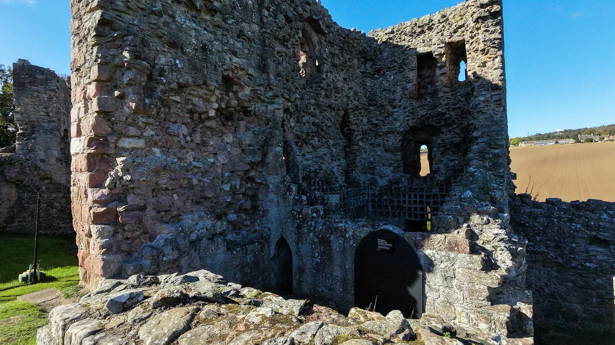 Hailes Castle walls under a blue sky