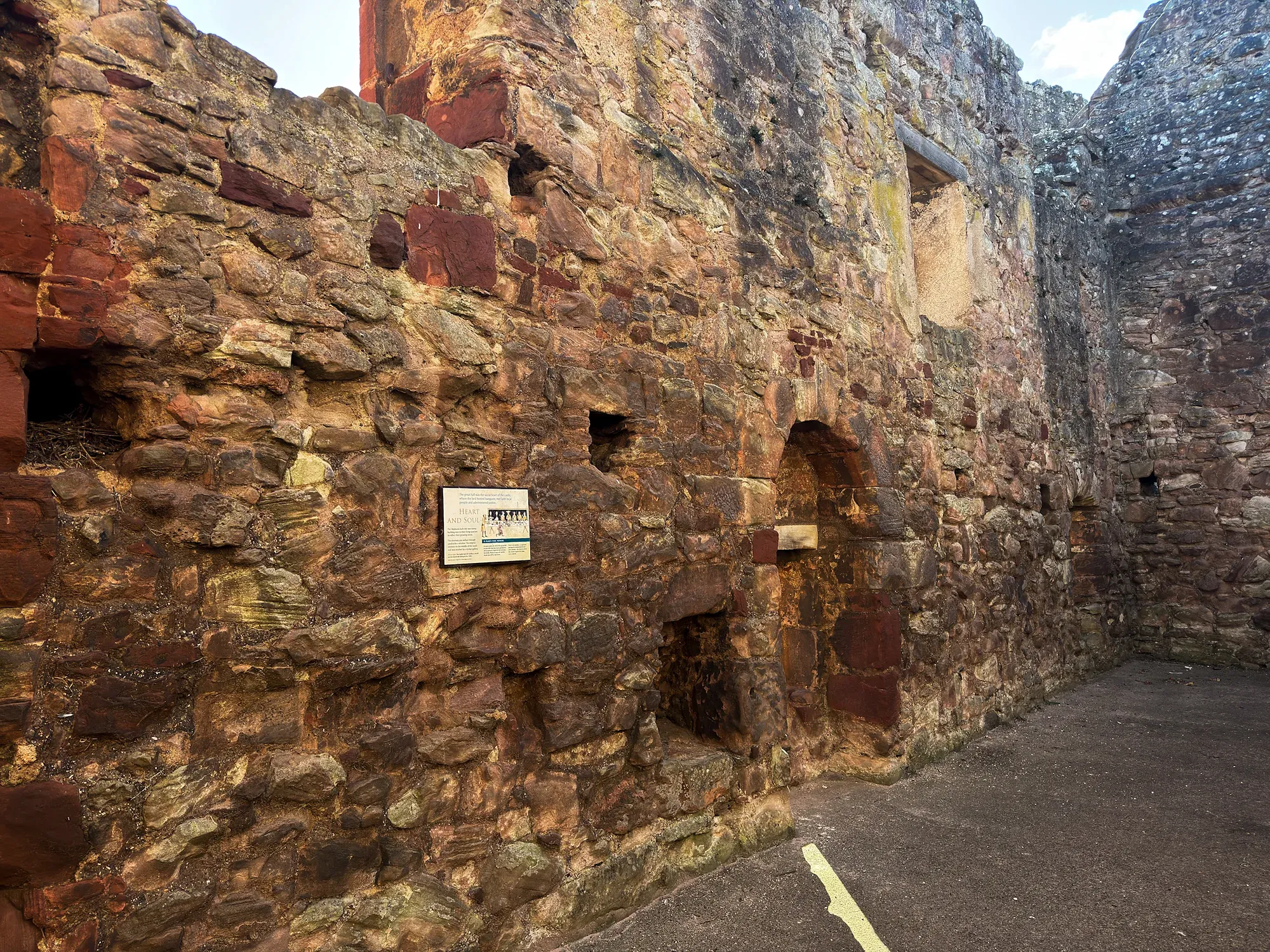Hailes Castle interior with a sign